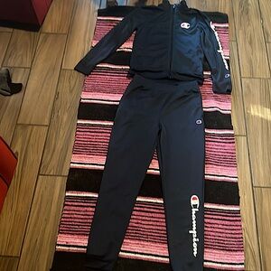 Champion joggers pants set boys color navy blue size L 2 pieces.